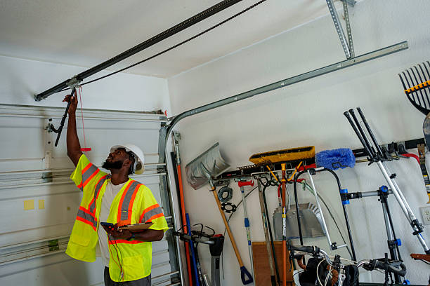 Professional Garage Door Panel Replacement technician working in Marietta, OK